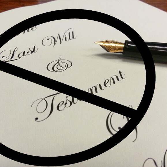 Word The Last will and testament with a circle with line across it.